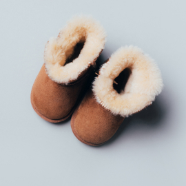 pair-of-brown-winter-shoes-on-grey-background-bro-2023-11-27-05-21-32-utc-1.jpg